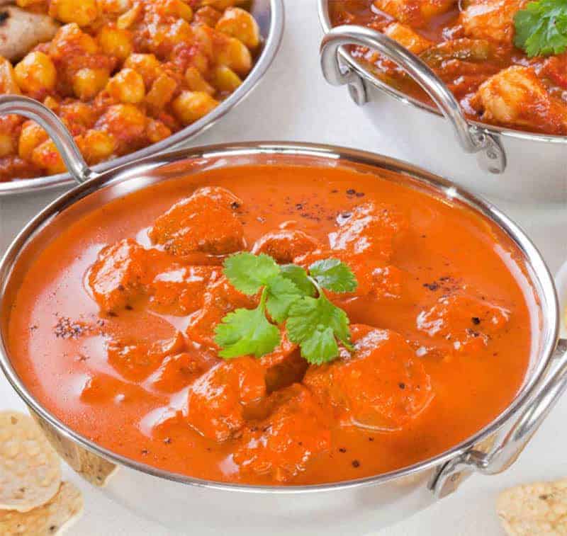 Samples of Khmer cuisine: Various bowls of curry, meat, vegetables